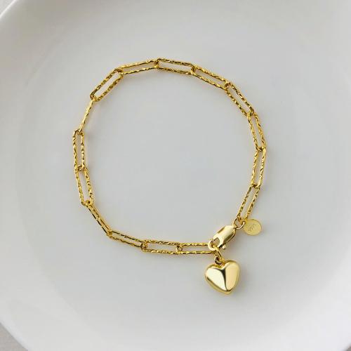 Gold plate textured paper clip chain lady bracelet with a heart charm